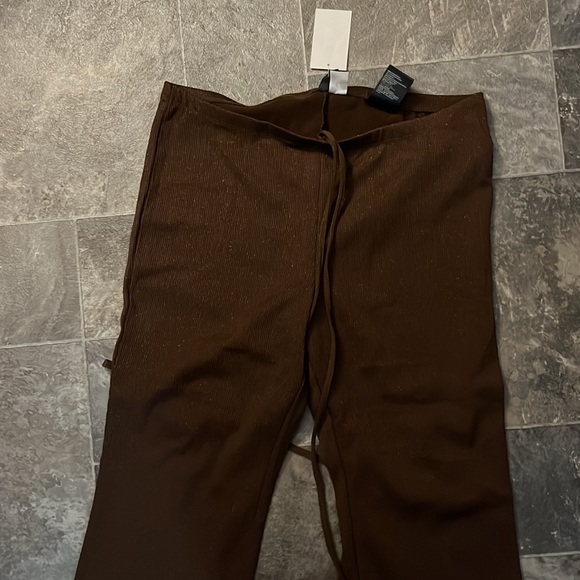 Glitter brow pants with flare and adjustable ties on waist - Picture 2 of 3